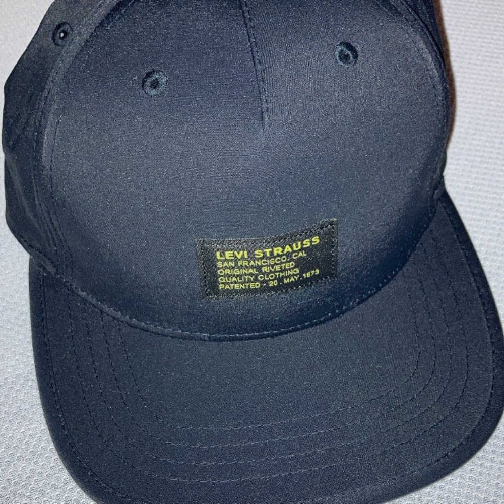 Black Levi hat. One size fits all. Adjustable string for perfect fit.